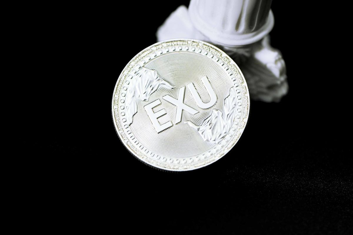gold and silver round coin
