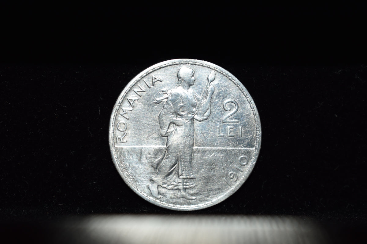 a close up of a coin on a table