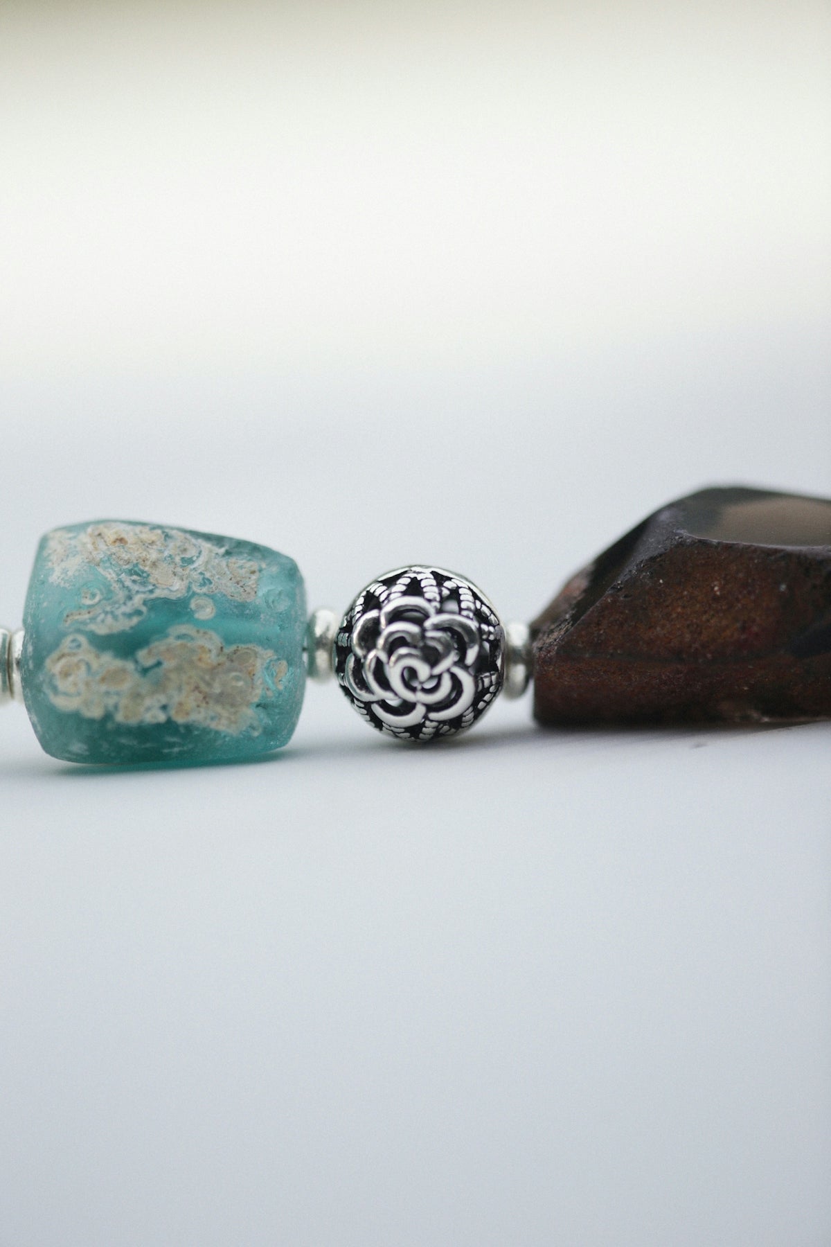 a couple of beads sitting on top of a table