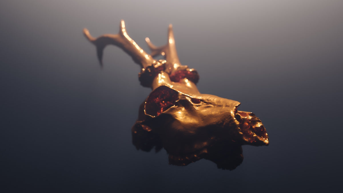 a close up of a piece of jewelry in the water