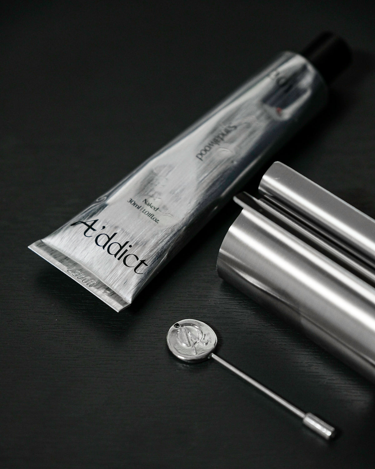 a close-up of a pen and a coin