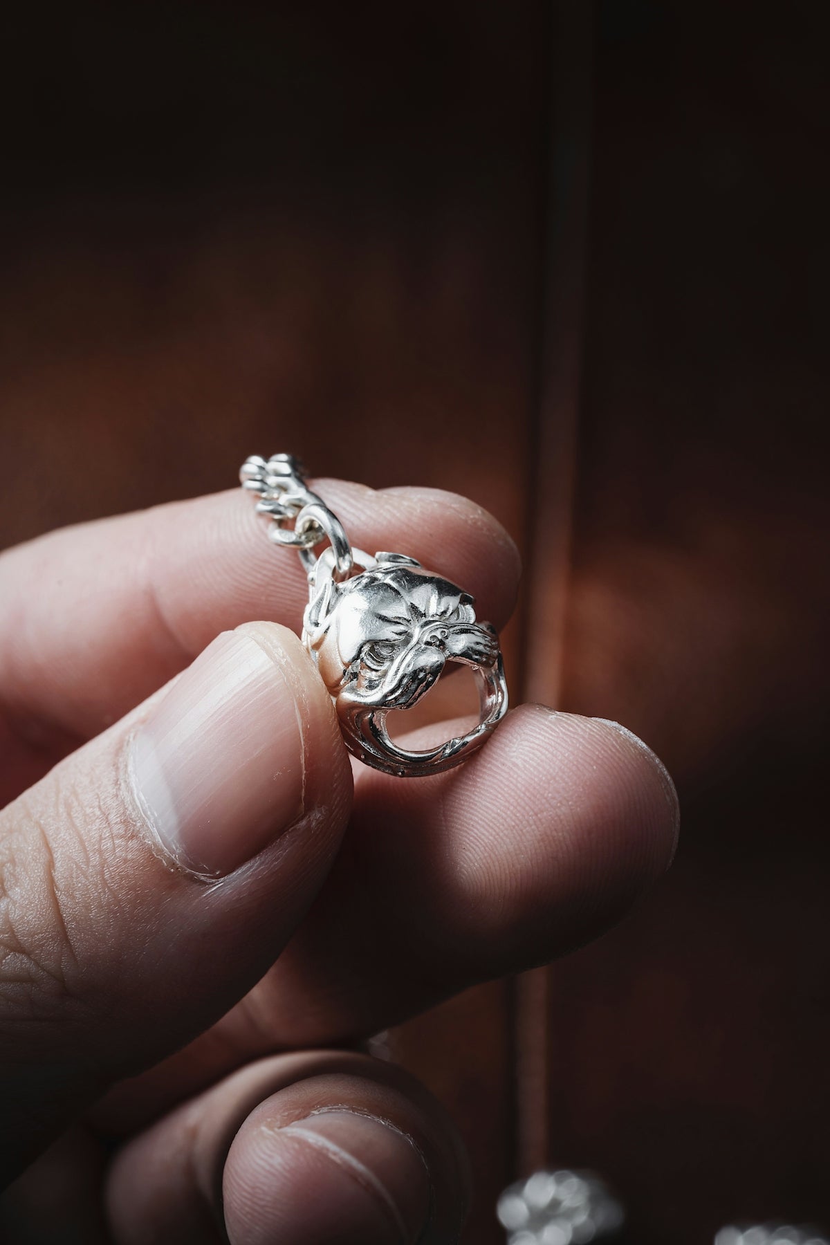 a person holding a ring in their hand