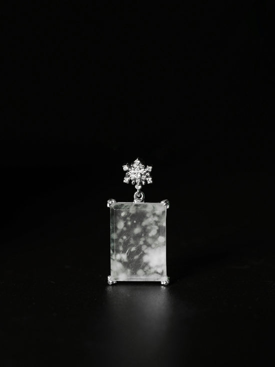 a black and white photo of a square object