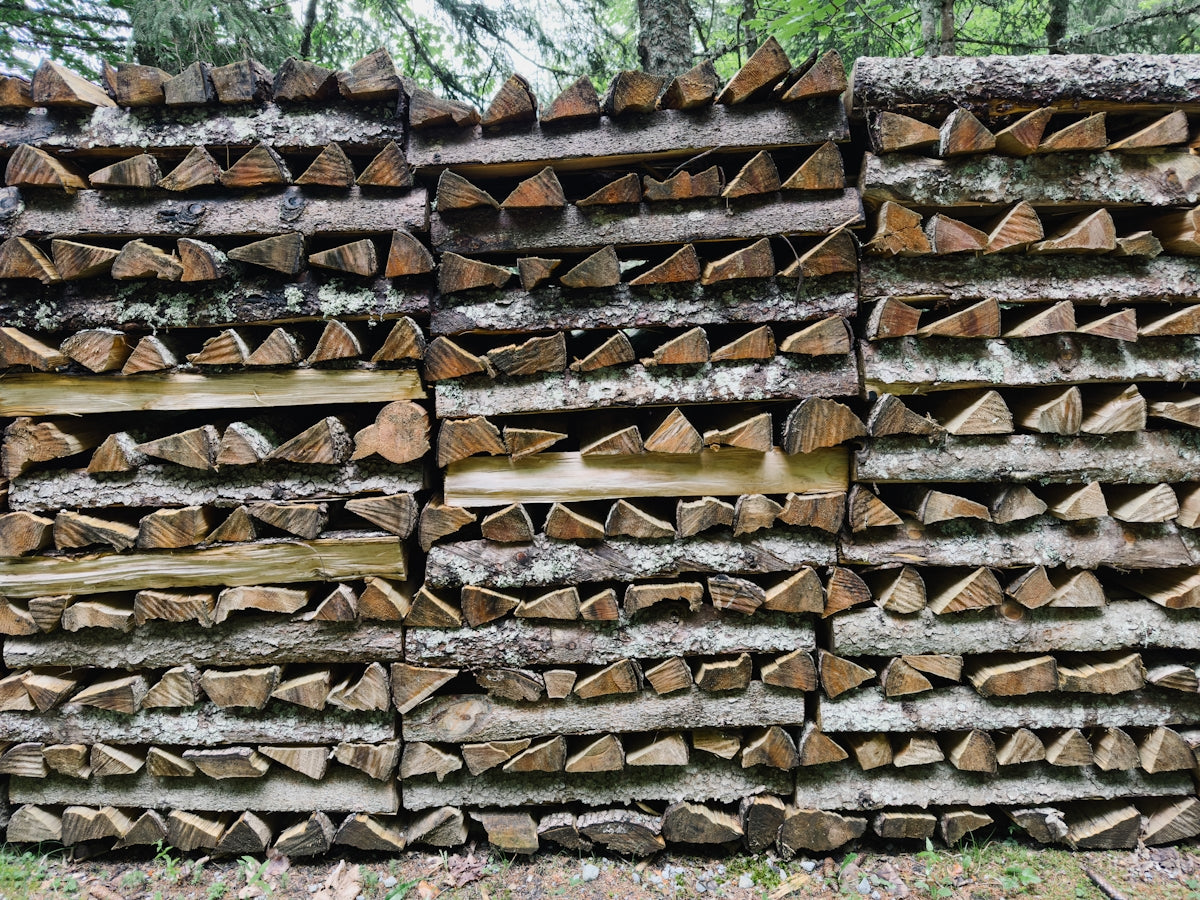 a pile of logs stacked on top of each other