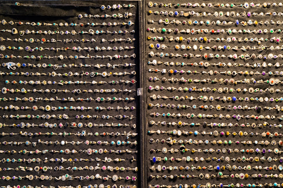 a large display case filled with lots of different kinds of buttons