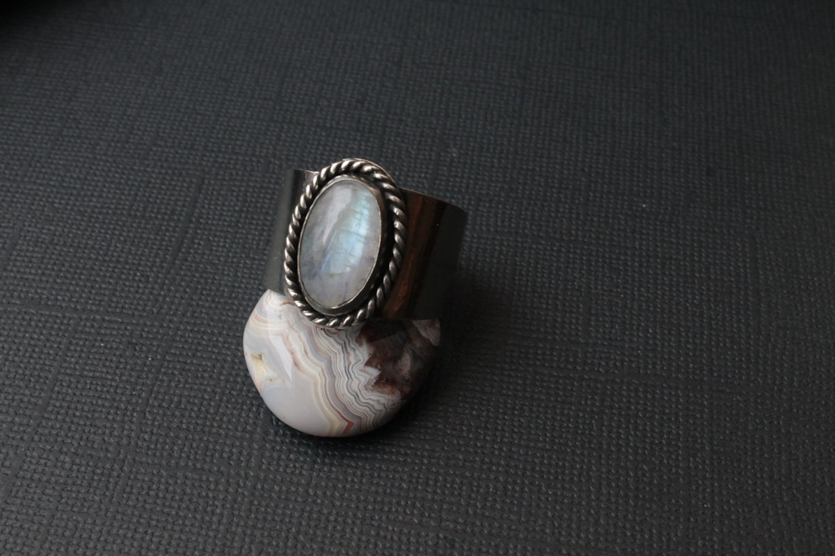 a ring that has a stone in the middle of it