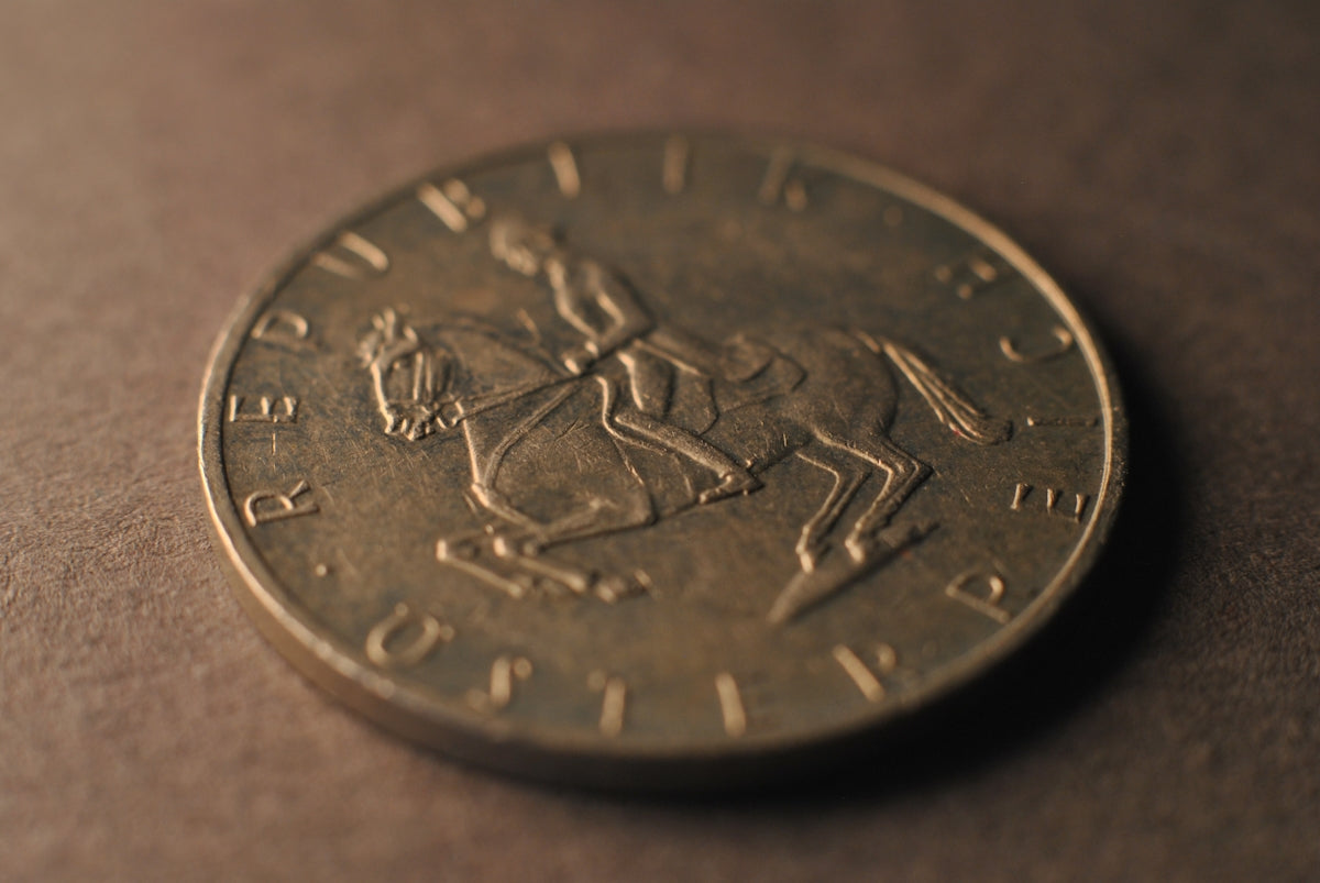 A close up of a coin on a table