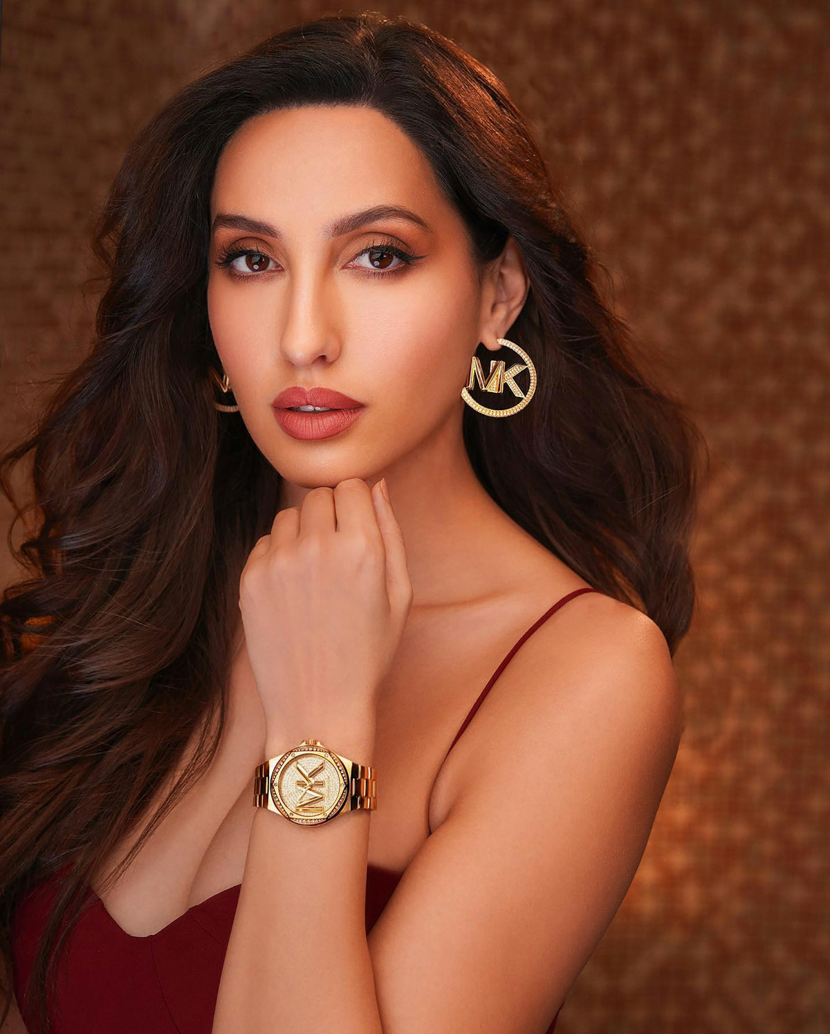 A woman in a red dress posing for a picture