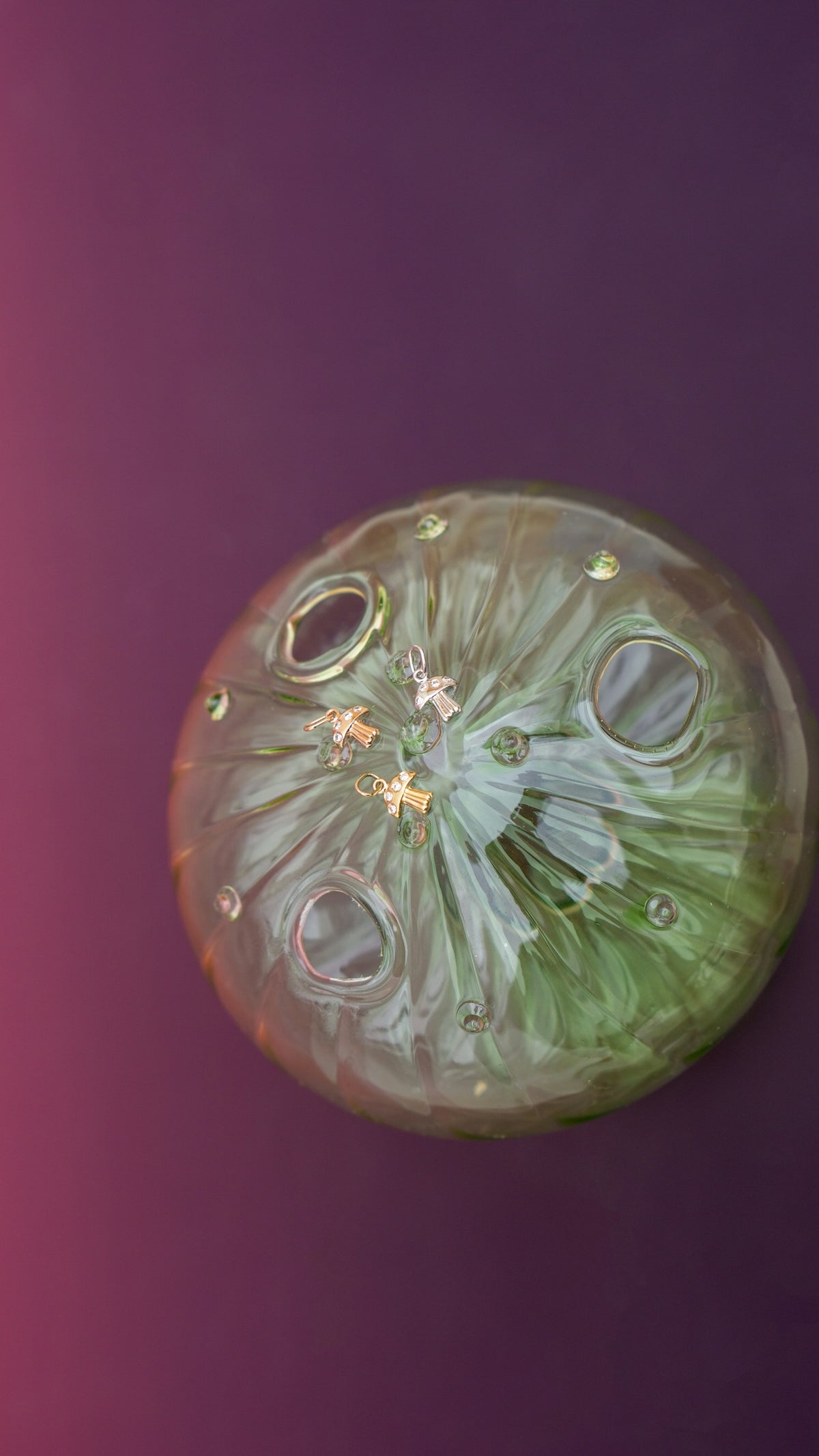 A green object floating on top of a purple surface