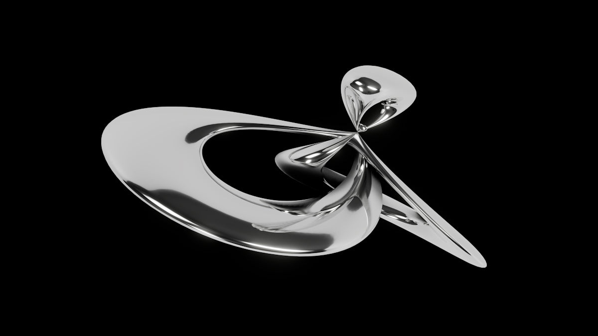 A silver object on a black background