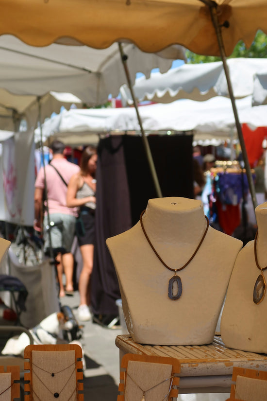 Jewelry displayed at a market.