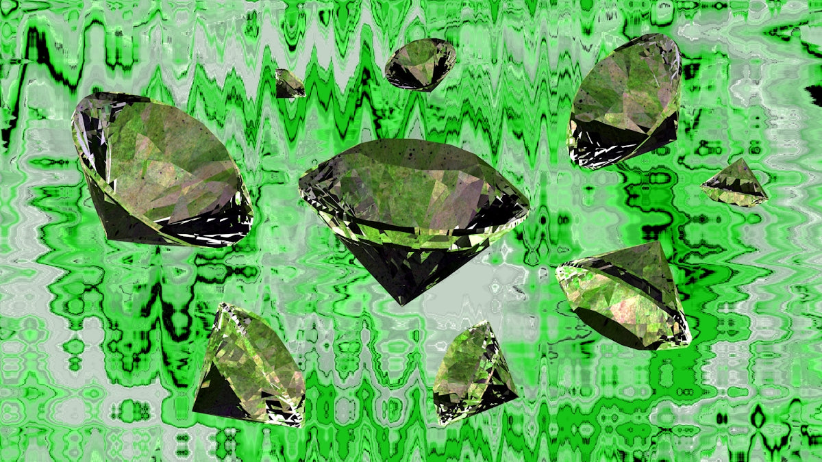 Several green diamonds floating on a green wavy background