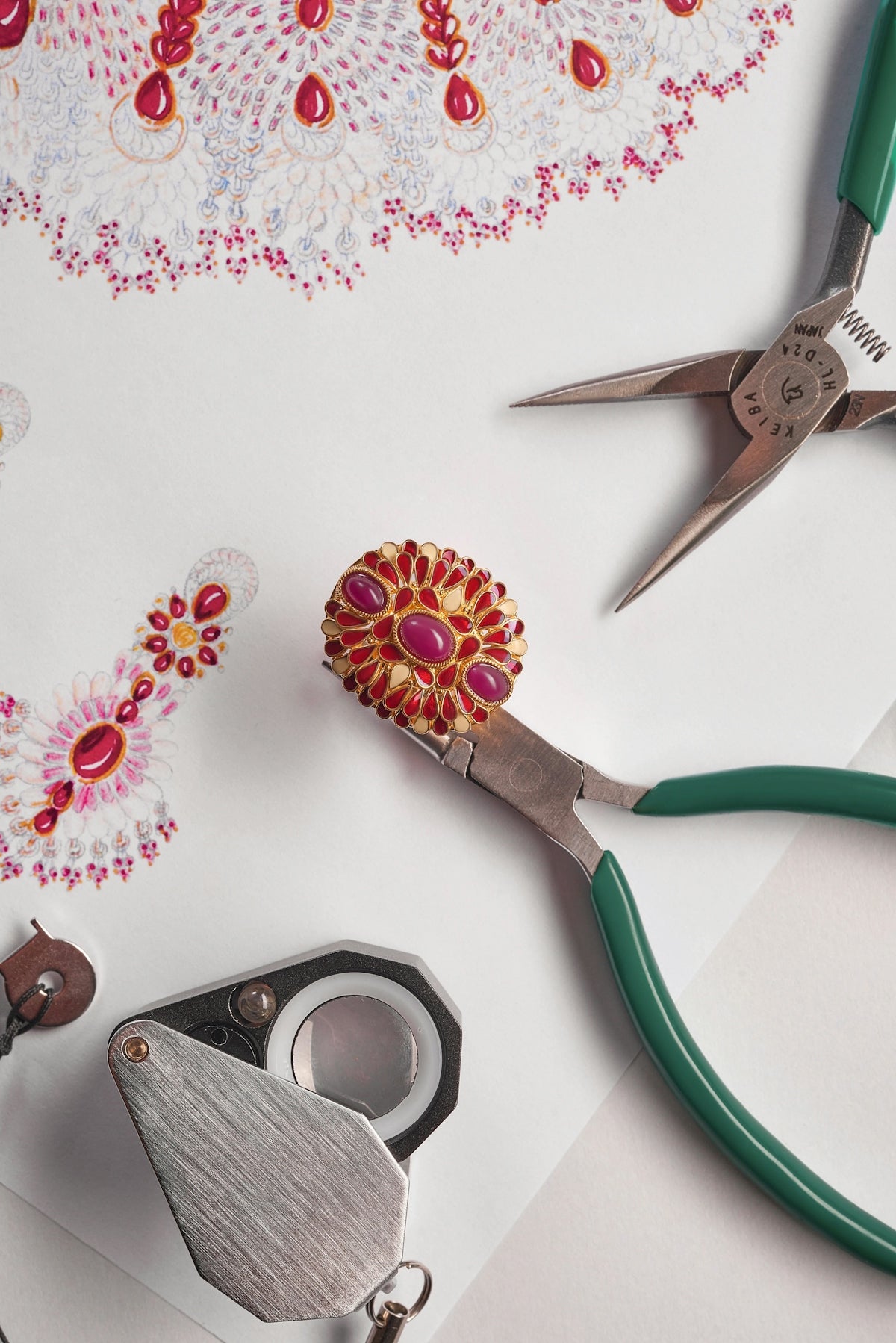 Jewelry design with tools and sketches