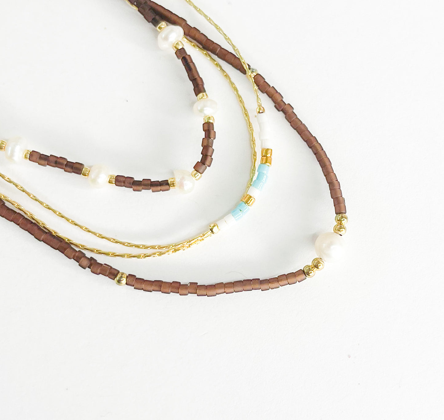 Brown Pearl Rope Stack w Blue, White, Gold Bracelet