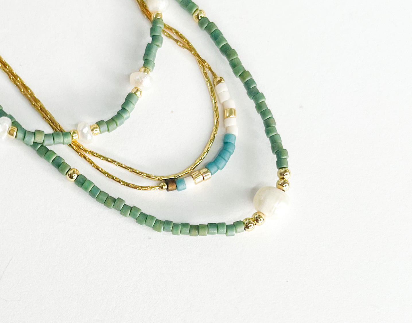Green Pearl Rope Stack w Blue, White, Gold Bracelet