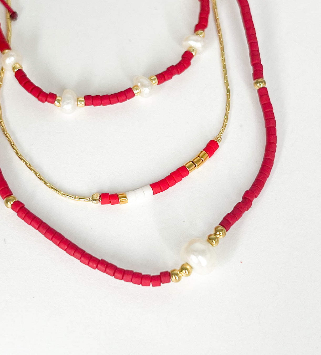 Red Pearl Rope Stack w Blue, White, Gold Bracelet
